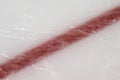 Ice hockey rink red markings closeup, winter sport background