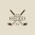 ice hockey stick and puck logo line art vintage vector illustration template icon graphic design. winter sport club sign or symbol Royalty Free Stock Photo