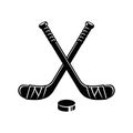 Ice hockey sticks and puck Royalty Free Stock Photo