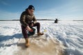 Ice hole fishing competition in Lapland Royalty Free Stock Photo