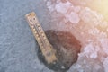 Ice hole fishing. Winter fishing in freezing cold weather concept Royalty Free Stock Photo