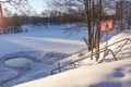 Ice hole in the lake in winter is equipped with a ladder for launching. prohibition sign with the inscription: do not go on the