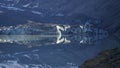 Ice on Hooker lake with Hooker Glacier and Mountains in the Background at Aoraki / Mount Cook in New Zealand. Royalty Free Stock Photo