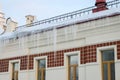 Ice icicles dangerously hanging from the roof