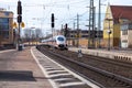 ICE 3, intercity-Express train from Deutsche Bahn passes train station Royalty Free Stock Photo