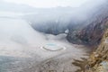 Ice lake in the crater of Gorely volcano, Kamchatka, Russia Royalty Free Stock Photo