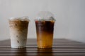 Ice latte coffee and espresso shot mixed with orange juice Royalty Free Stock Photo