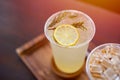 Ice lemon soda juice on wooden table Royalty Free Stock Photo