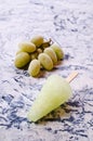 Ice lolly of green grapes