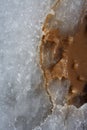 Ice meltwater soil on red clay mud Royalty Free Stock Photo