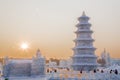 Ice pagoda at sunset at the ice festival in Harbin Royalty Free Stock Photo