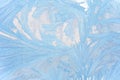 Ice patterns on glass, snow on the window, winter background Royalty Free Stock Photo