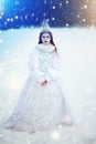 Ice queen with crown in winter landscape Royalty Free Stock Photo