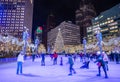 Christmas Tree at Campus Martius Park at night in downtown Detroit, Michigan at Christmastime. A giant Christmas Tree is on top of