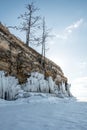 Ice rock on the frozen winter lake on the island of Olkhon. Beautiful nature of Siberia