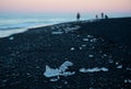 Ice rocks on the black sand beach at Diamond Beach, Iceland Summer.