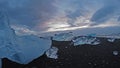 Ice rocks over black sand beach at Diamond beach Iceland