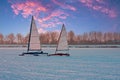 Ice sailing on a cold winter day on the Gouwzee in the Netherlands at sunset Royalty Free Stock Photo