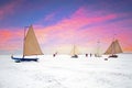 Ice sailing on the Gouwzee in winter in the Netherlands at sunset Royalty Free Stock Photo