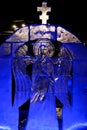 Ice sculpture. Angel with wings. The Feast of the Epiphany. People bathe in the ice-hole.