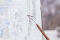 Ice sculpture carving man use chisel cut frozen winter Royalty Free Stock Photo