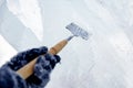 Ice sculpture carving man use chisel cut frozen winter Royalty Free Stock Photo