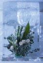 Ice sculpture of flowers in a frozen block of ice Royalty Free Stock Photo
