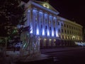 Ice sculpture 2021 near a beautiful glowing building/ Royalty Free Stock Photo