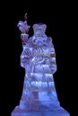 Ice sculpture of Santa Claus isolated on black