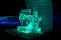 Ice sculpture of sewing machine lights in the night