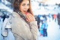 Ice-Skateing, beautiful woman holds Ice Skating shoes for hockey.