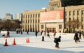 Ice skaters enjoying a sunny December afternoon