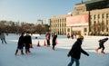 Ice skaters enjoying a sunny December afternoon