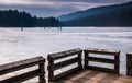 Ice skaters on a frozen lake at Cowans Gap State Park, Pennsylvania. Royalty Free Stock Photo