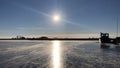 ice skaters on frozen lake in the netherlands Royalty Free Stock Photo