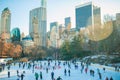 Ice skaters having fun in New York Central Park in winter Royalty Free Stock Photo