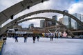 Ice skaters in Nathan Phillips Square. Royalty Free Stock Photo
