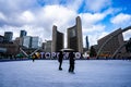 Ice skaters in Nathan Phillips Square. Royalty Free Stock Photo