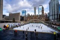 Ice skaters in Nathan Phillips Square. Royalty Free Stock Photo