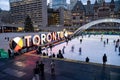 Ice skaters in Nathan Phillips Square. Royalty Free Stock Photo