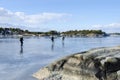 Ice skaters in Stockholm archipelago Royalty Free Stock Photo