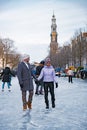 Ice skating on the canals in Amsterdam the Netherlands in winter, frozen canals in Amsterdam during winter Royalty Free Stock Photo