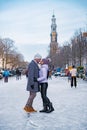 Ice skating on the canals in Amsterdam the Netherlands in winter, frozen canals in Amsterdam during winter Royalty Free Stock Photo