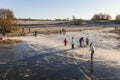 Ice skating on a lake at the countryside in the winter Royalty Free Stock Photo