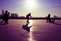 Ice skating at sunset in the Netherlands Royalty Free Stock Photo