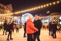 Ice skating together. Romantic winter vacation in ice arena. Young couple skating at ice rink. Best Christmas ever. Winter fun.