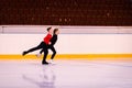 children-athletes learn pair figure skating. parallel pair motion.