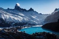 Ice- and snow-covered shores of clean mountain lake