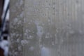Ice and snow on the glass wall of the house Royalty Free Stock Photo