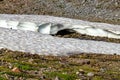 ice and snow sheet on a rocky volcanic soil